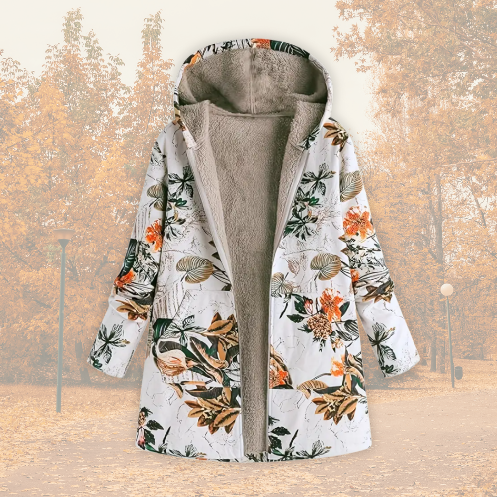 Veste à capuche doublée polaire, fond blanc imprimé feuillages, fermeture zippée.