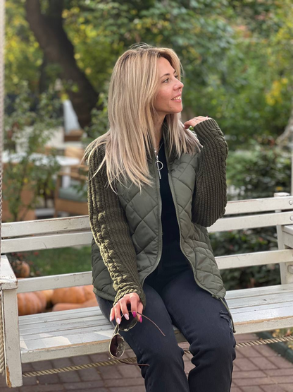 Veste matelassée vert olive avec fermeture zippée, surpiqûres losanges et col montant