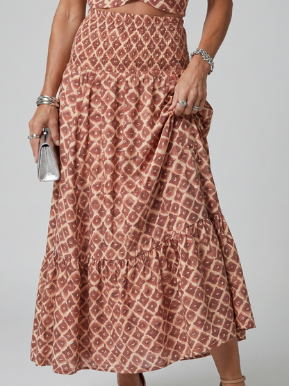 Jupe de robe midi imprimée géométrique brique, volants et taille froncée.
