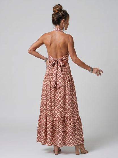 Robe midi asymétrique imprimée géométrique brique, dos nu avec nœud et découpe.