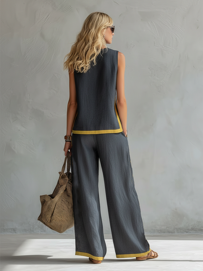 Ensemble deux pièces gris foncé : débardeur sans manches et pantalon ample à passepoil jaune
