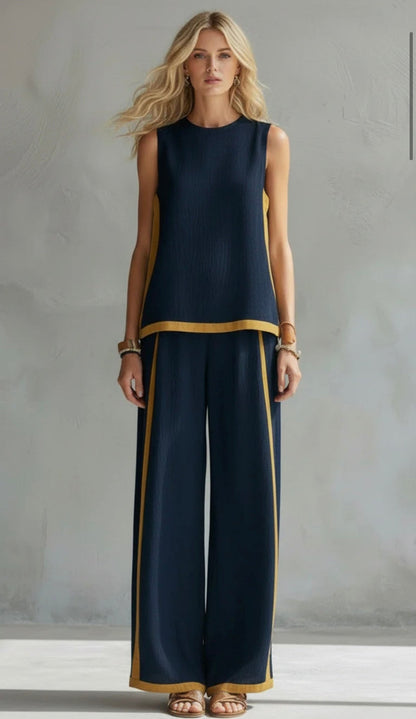 Ensemble deux pièces bleu marine, débardeur et pantalon long ample à passepoil jaune