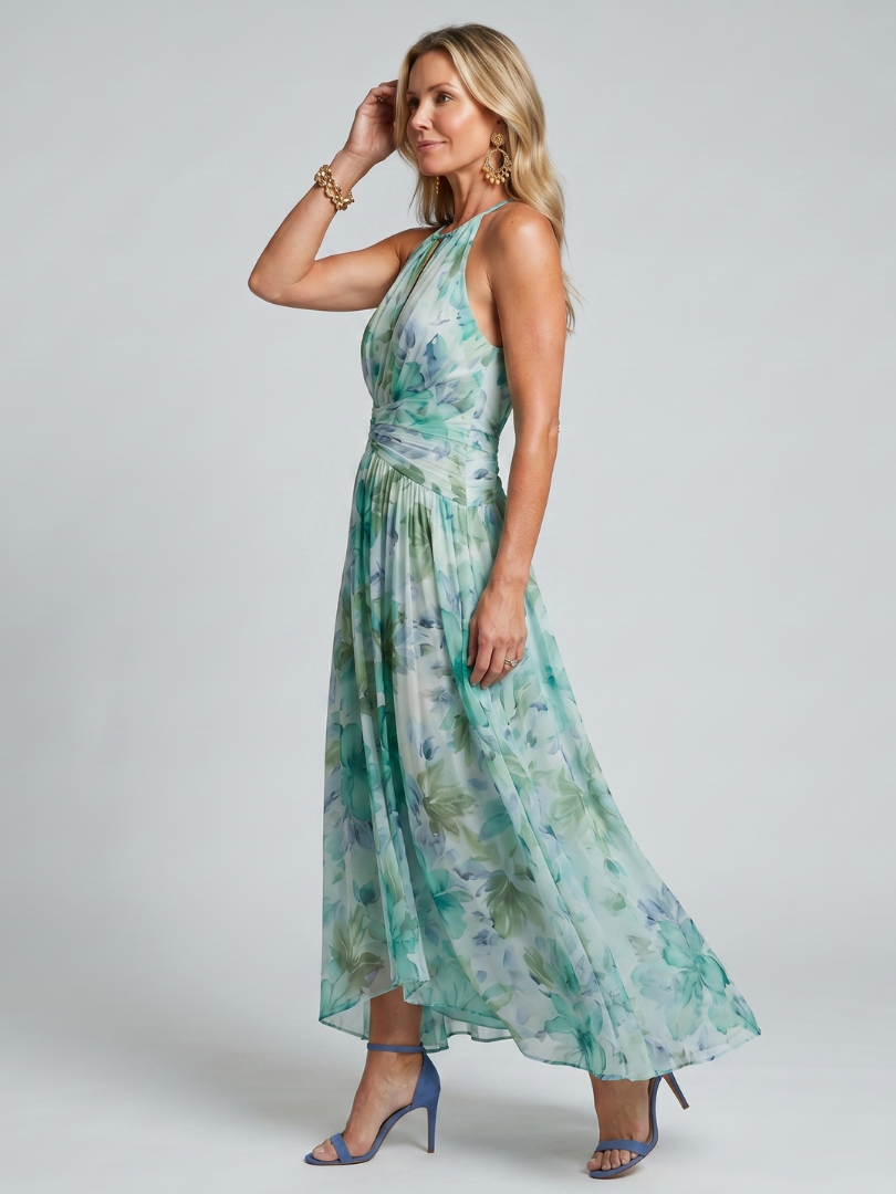 Robe longue plissée vert d’eau à col montant sans manches, motif floral doux