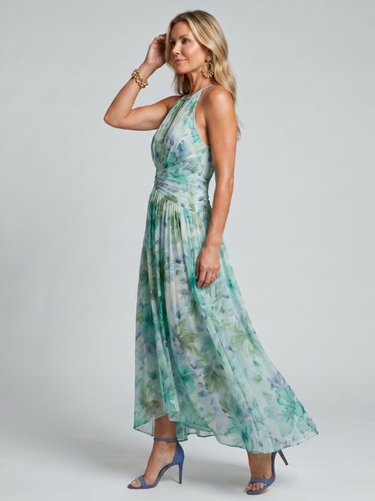 Robe longue plissée vert d’eau à col montant sans manches, motif floral doux