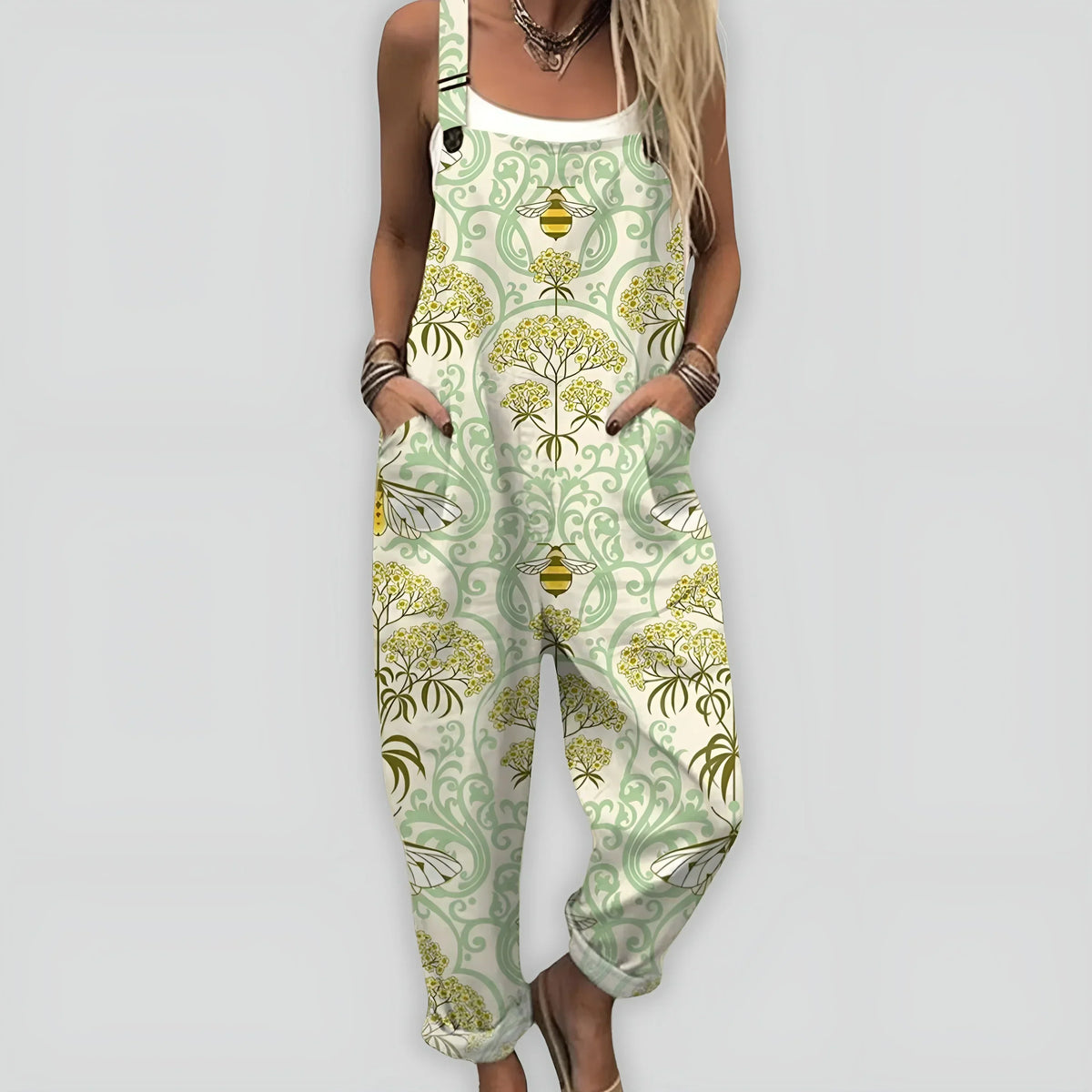 Combinaison ample sans manches blanc cassé et vert clair, motif abeilles et fleurs.