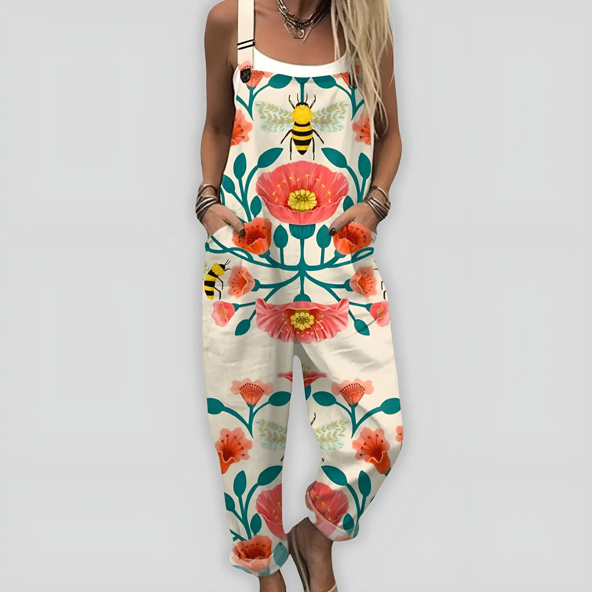 Combinaison ample sans manches ivoire, motif fleurs colorées et abeille jaune.