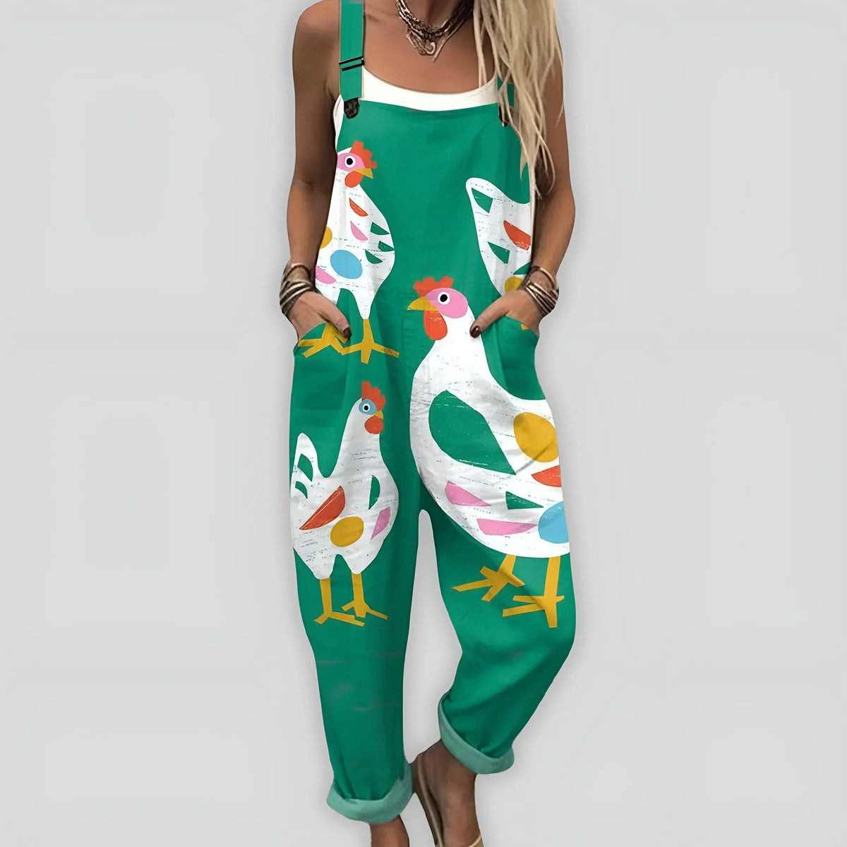 Combinaison ample sans manches vert, motif d’oiseaux multicolores.