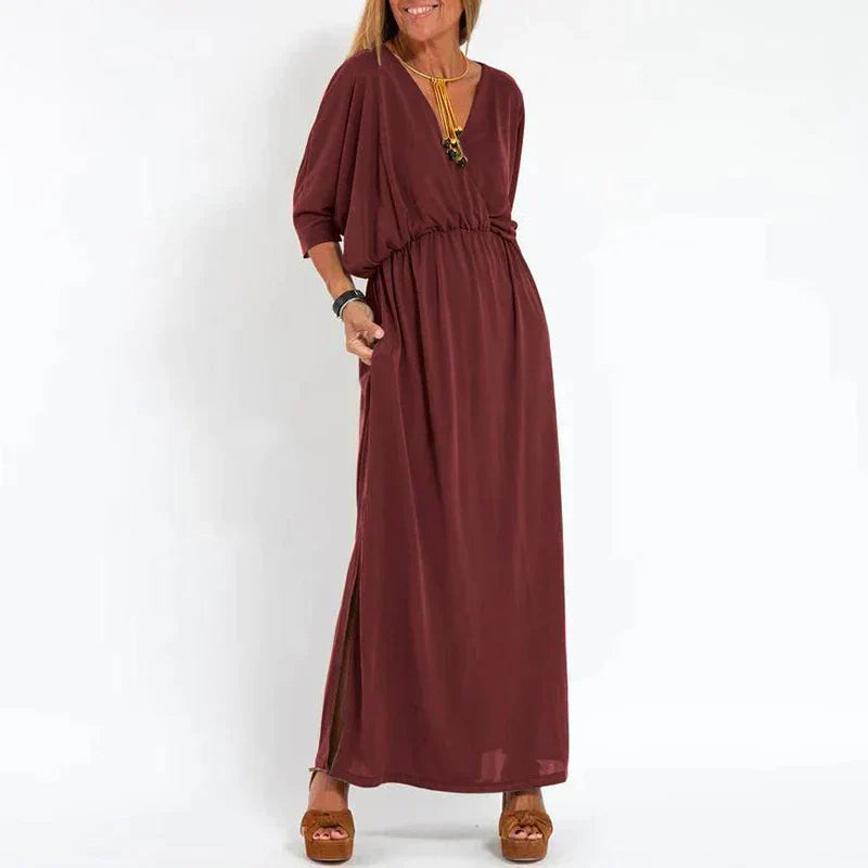 Robe longue vintage rouge bordeaux, manches 3/4 bouffantes, taille froncée, fente latérale.
