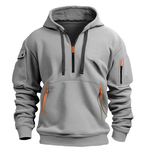 Sweat à capuche gris clair, zip demi-col, poche kangourou et poches zippées sur les manches