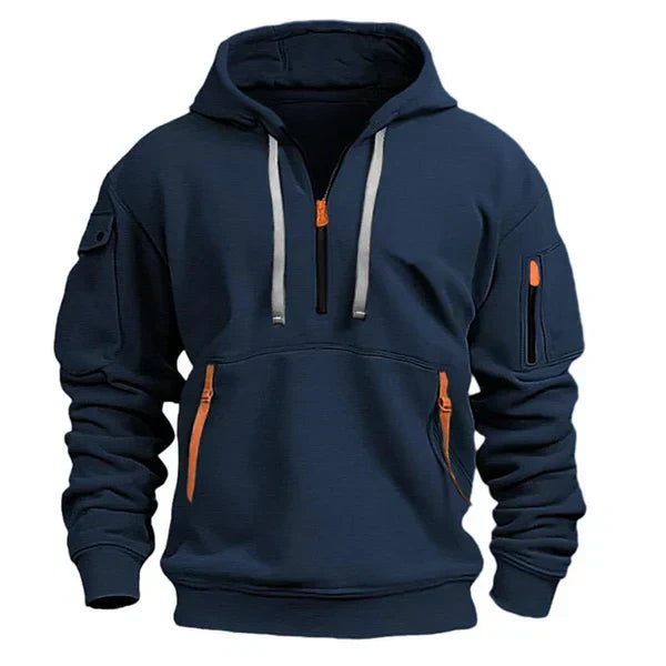 Sweat à capuche bleu marine, zip à l’encolure, poche kangourou et poches zippées sur les manches