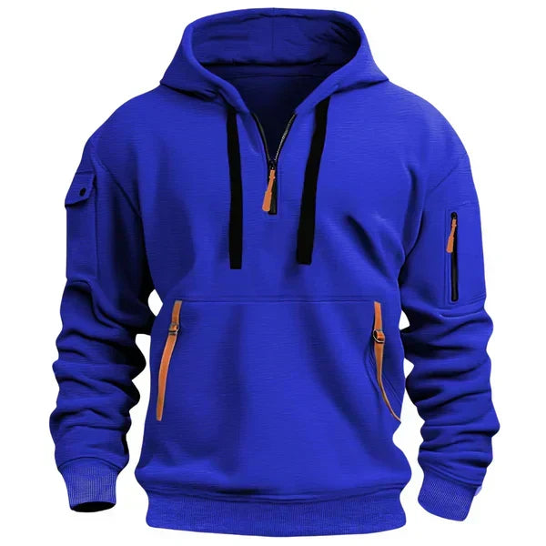 Sweat à capuche bleu vif, zip à l’encolure, poche kangourou et poches zippées sur les manches