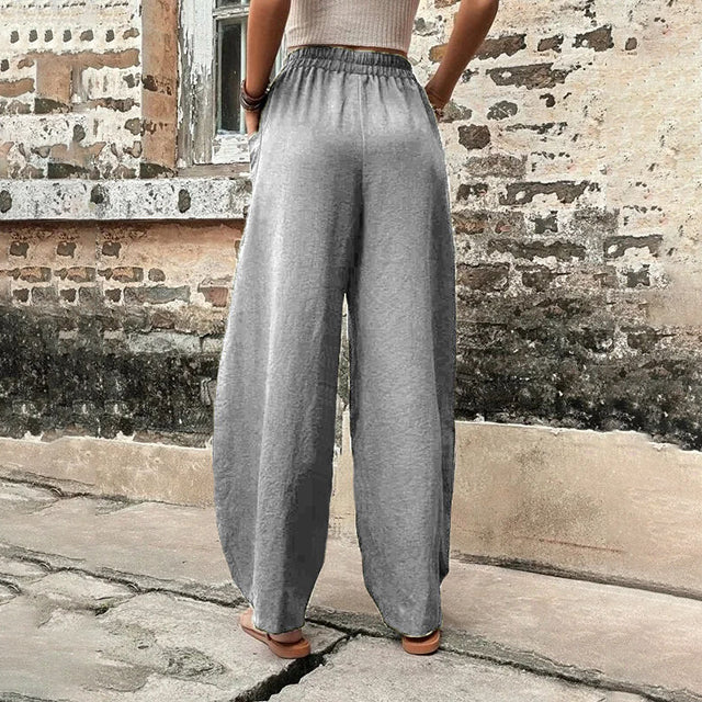 Pantalon fluide gris à taille froncée, jambes larges, tombé ample