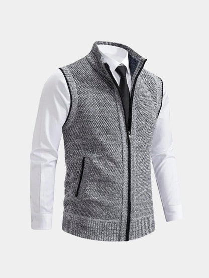 Gilet gris à fermeture éclair intégrale, maille chinée, col montant, finitions côtelées.