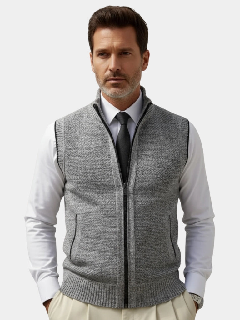 Gilet gris texturé à fermeture éclair intégrale, col montant, poches poitrine discret.
