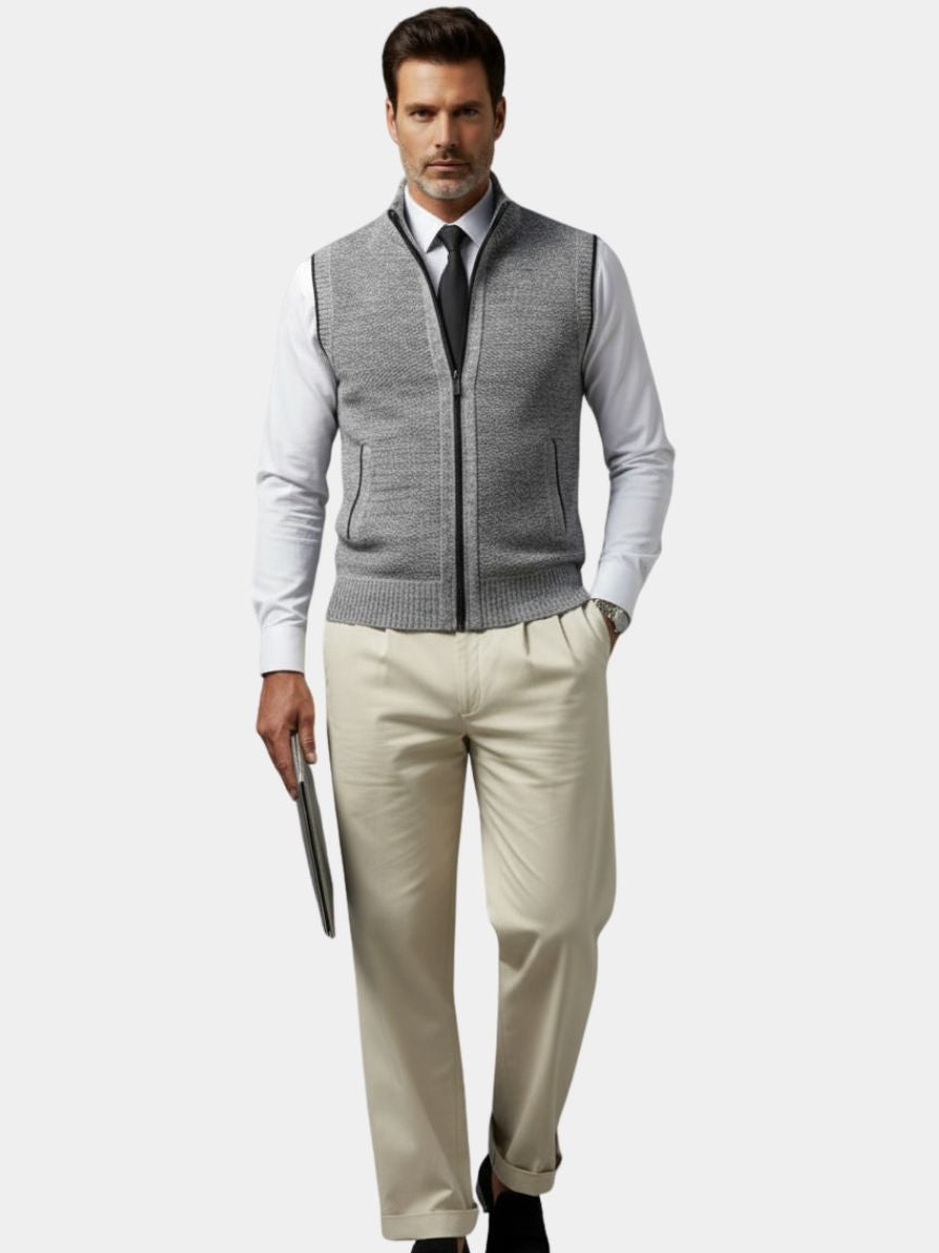 Gilet gris à fermeture éclair intégrale, maille côtelée bas et poignets, style élégant.