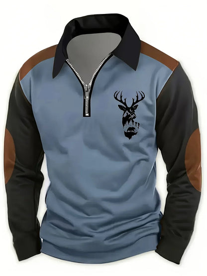 Pull col zippé bleu, manches noires, motif tête de cerf sur la poitrine.