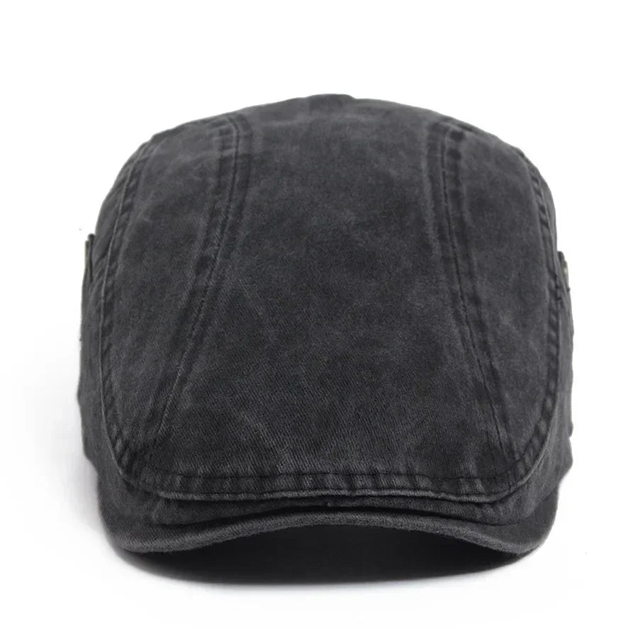 Casquette vintage homme gris foncé, vue de dessus, couture centrale et forme arrondie.