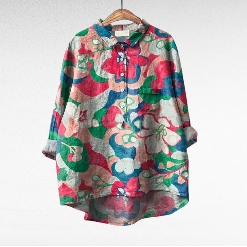 Blouse boutonnée à motif floral sur fond gris, col chemise, manches longues