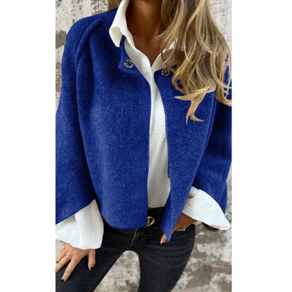 Veste courte bleue à col boutonné, manches évasées, tissu doux