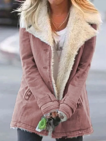 Veste manches longues rose clair avec col en fausse fourrure beige et fermeture zippée
