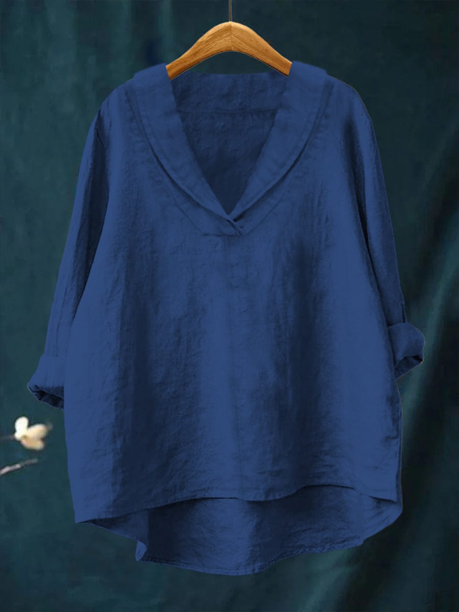 Blouse fluide col V bleue, manches trois-quarts, coupe ample