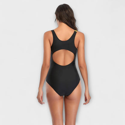 Maillot de bain une pièce sportif noir à découpes au dos et ouverture arrondie