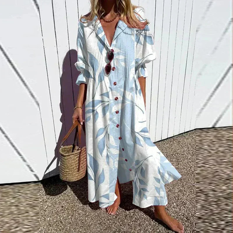 Robe longue blanche à boutons bordeaux, col ouvert, manches volantées
