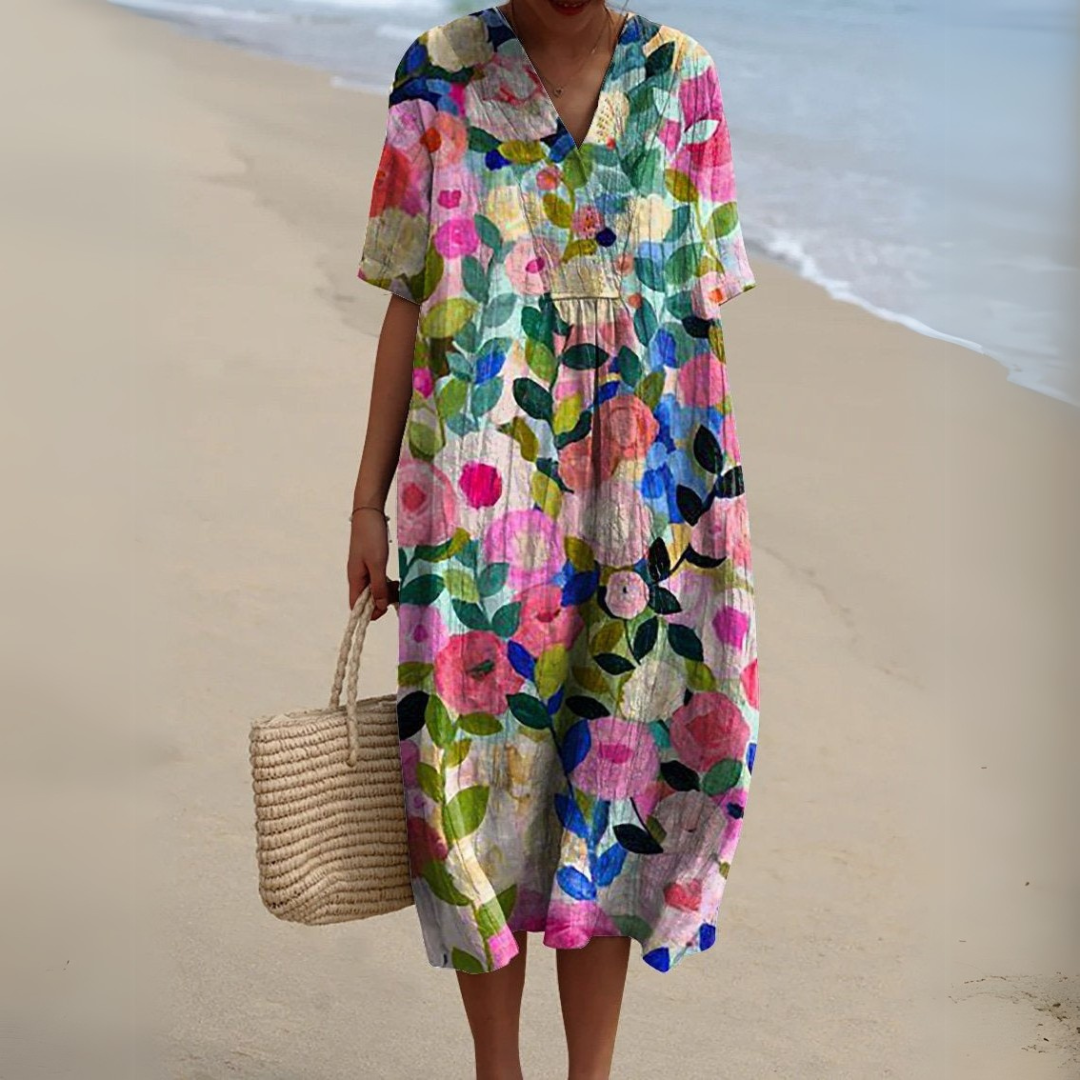 Robe mi-longue ample manches courtes, col V, fleurs multicolores sur fond clair