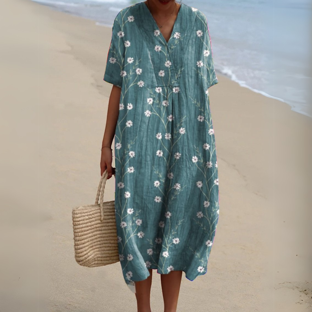 Robe mi-longue ample manches courtes, col V, motif floral blanc sur fond bleu-vert