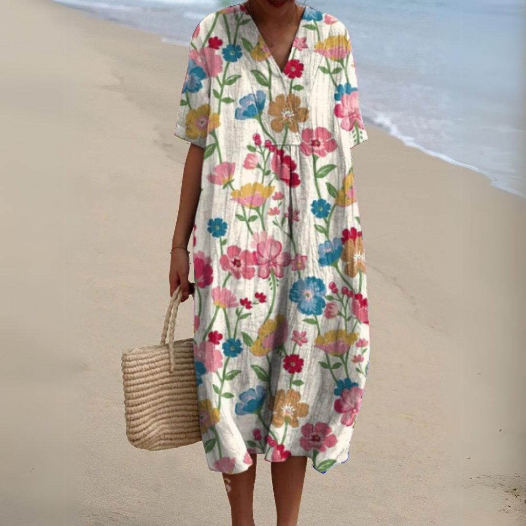 Robe mi-longue ample manches courtes, col V, fleurs multicolores sur fond crème clair