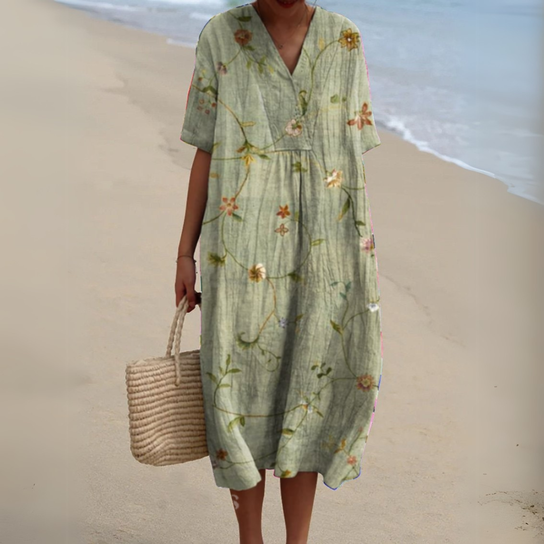 Robe mi-longue ample manches courtes, col V, fleurs colorées sur fond vert clair