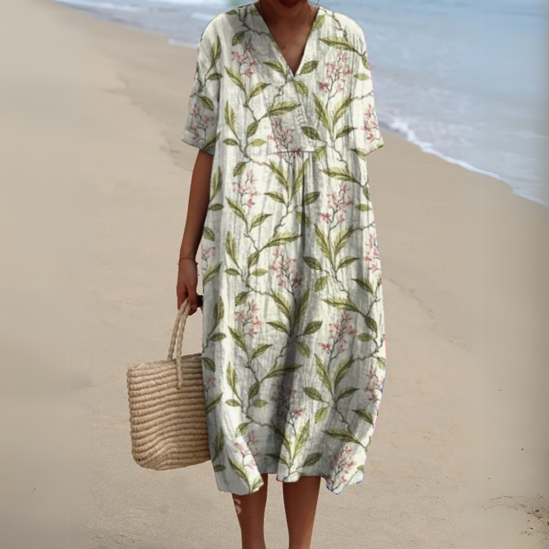 Robe mi-longue ample manches courtes, col V, feuilles et fleurs rose sur fond blanc cassé