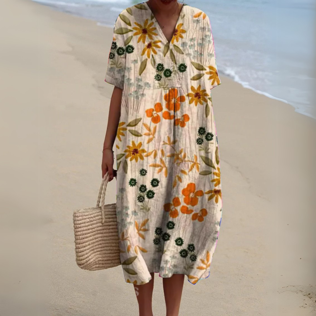 Robe blanche fleurie orange et verte, encolure V, manches courtes, coupe ample