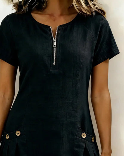 Robe Lina™ noire en lin, manches courtes, fermeture zippée et poches poitrine