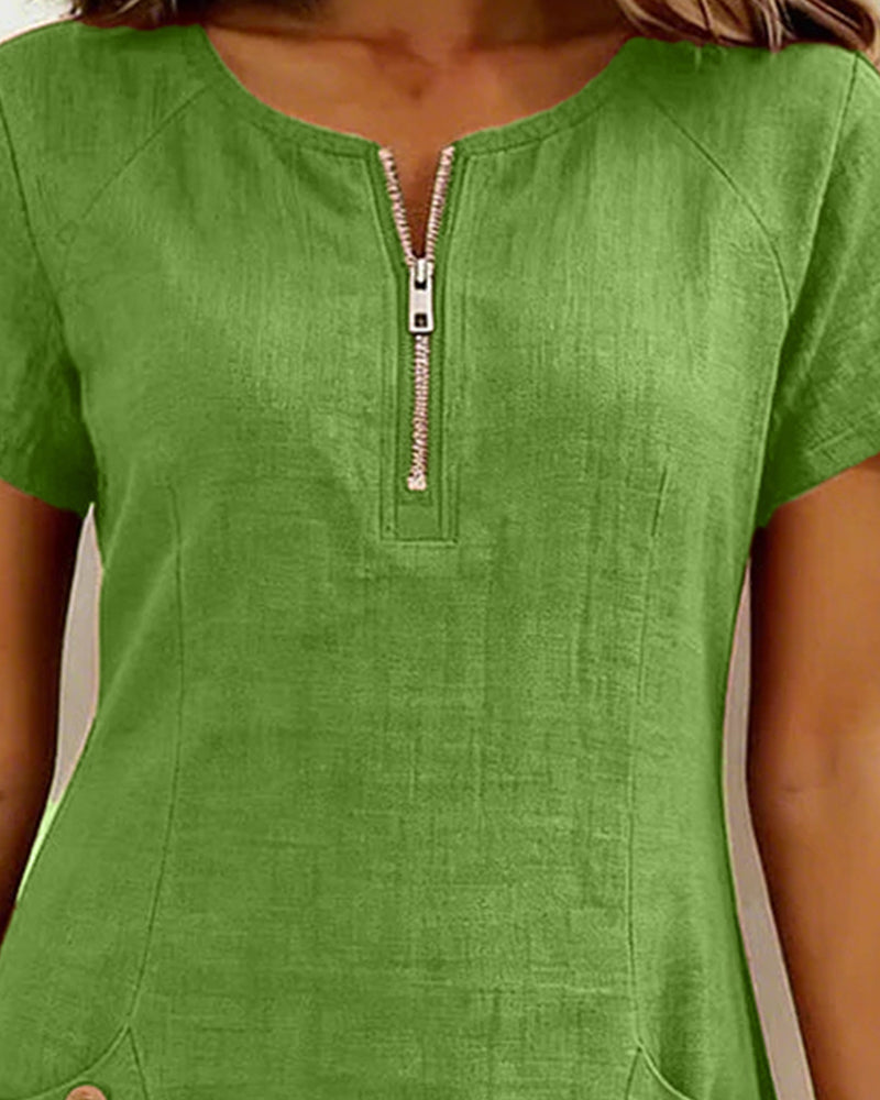 Robe verte courte avec fermeture éclair au col et manches courtes