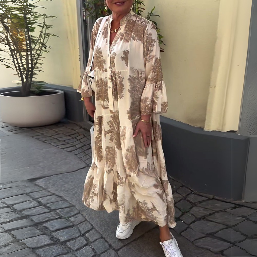 Robe longue beige à imprimé brun, col V et manches longues bouffantes.
