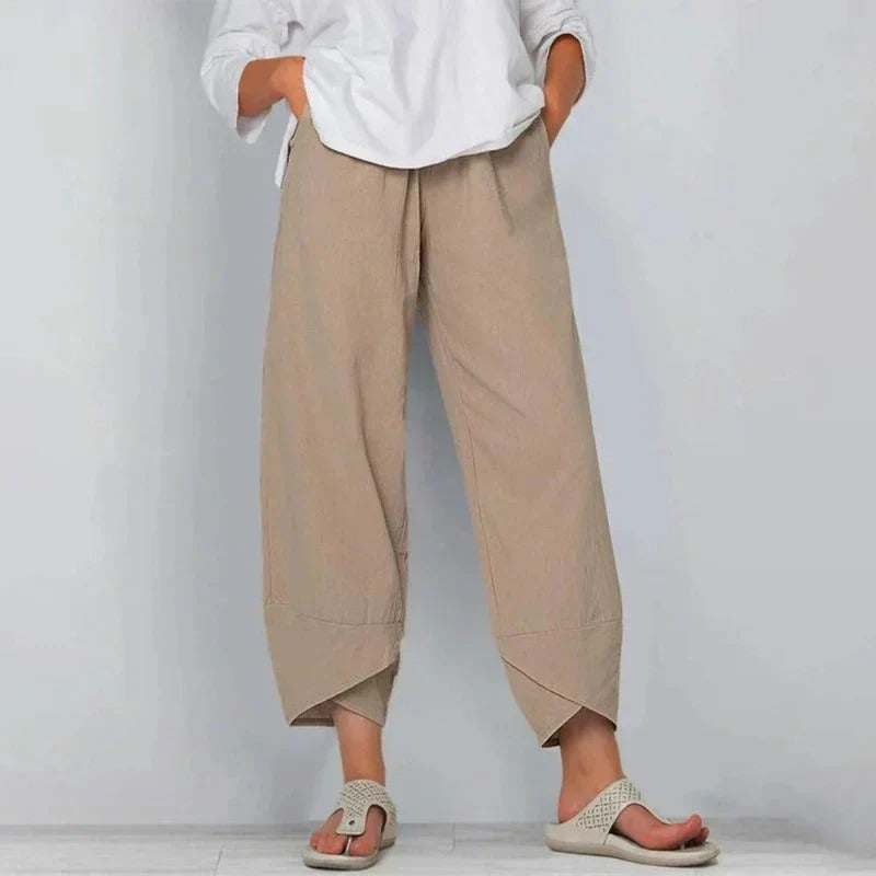 Pantalon d’été kaki ample 7/8, taille élastique, ourlet asymétrique.