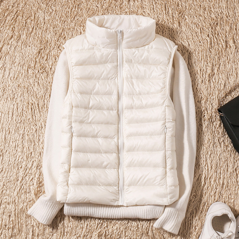 Gilet en duvet Saphire blanc, sans manches, matelassé, fermeture zippée, col montant