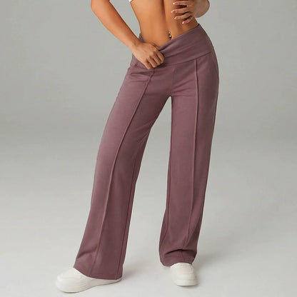 Pantalon femme à jambes larges et droites, taille haute. Tissu extensible