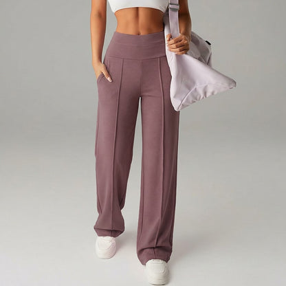 Pantalon femme à jambes larges et droites, taille haute. Tissu extensible