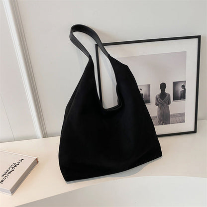Cabas en daim Sena noir, anses courtes, forme de sac hobo
