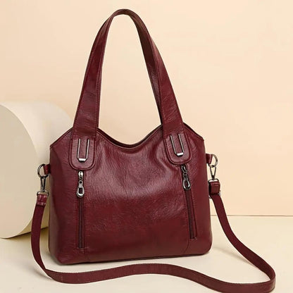 Sac à bandoulière vintage bordeaux avec anses, bandoulière réglable et fermetures éclair