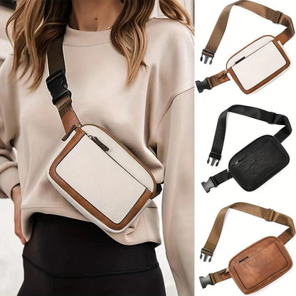Sac bandoulière en cuir blanc, noir et marron, poche zippée et bandoulière.
