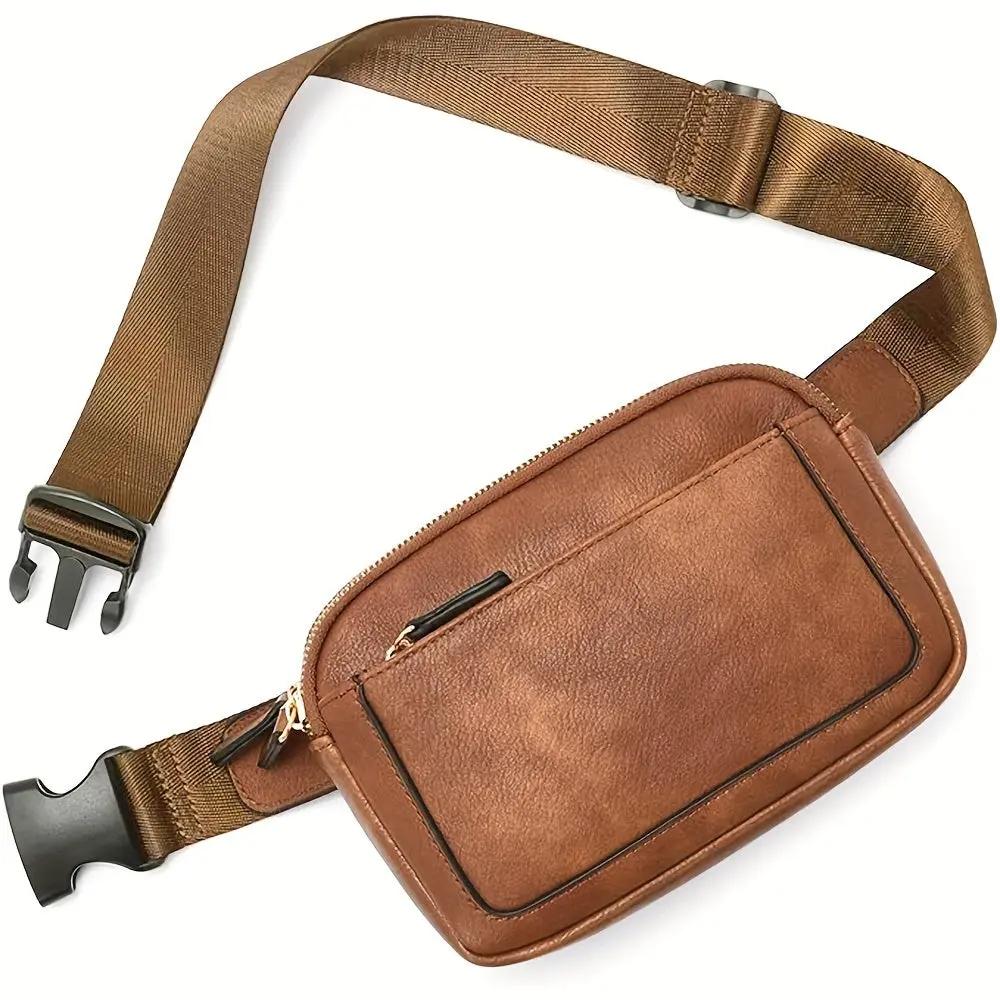 Sac bandoulière en cuir marron, poche zippée centrale et sangle réglable.
