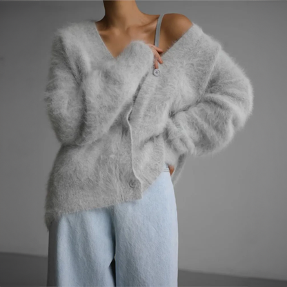 Cardigan en cachemire gris clair, encolure V boutonnée, manches larges torsadées