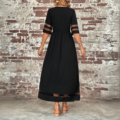 Robe midi noire Cerelia, vue de dos, taille froncée, manches 3/4 à empiècements