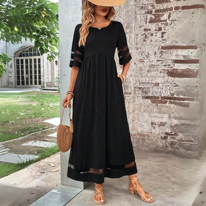 Robe midi noire, décolleté rond, manches 3/4 à bandes, ourlet contrasté