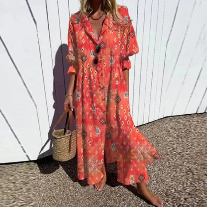 Robe bohème longue rouge à motifs, encolure V boutonnée, manches volant.