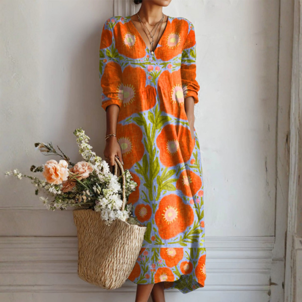 Robe midi multicolore à fleurs, encolure cache-cœur, manches longues bouffantes.