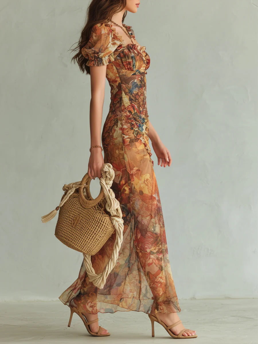 Robe longue multicolore à imprimé peinture à l’huile, manches bouffantes, fente au bas.
